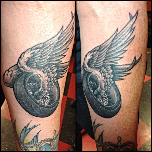 Bold motorcycle tattoos like winged wheels, skulls, flames, and engines symbolize freedom, brotherhood, rebellion, and eternal rider loyalty.